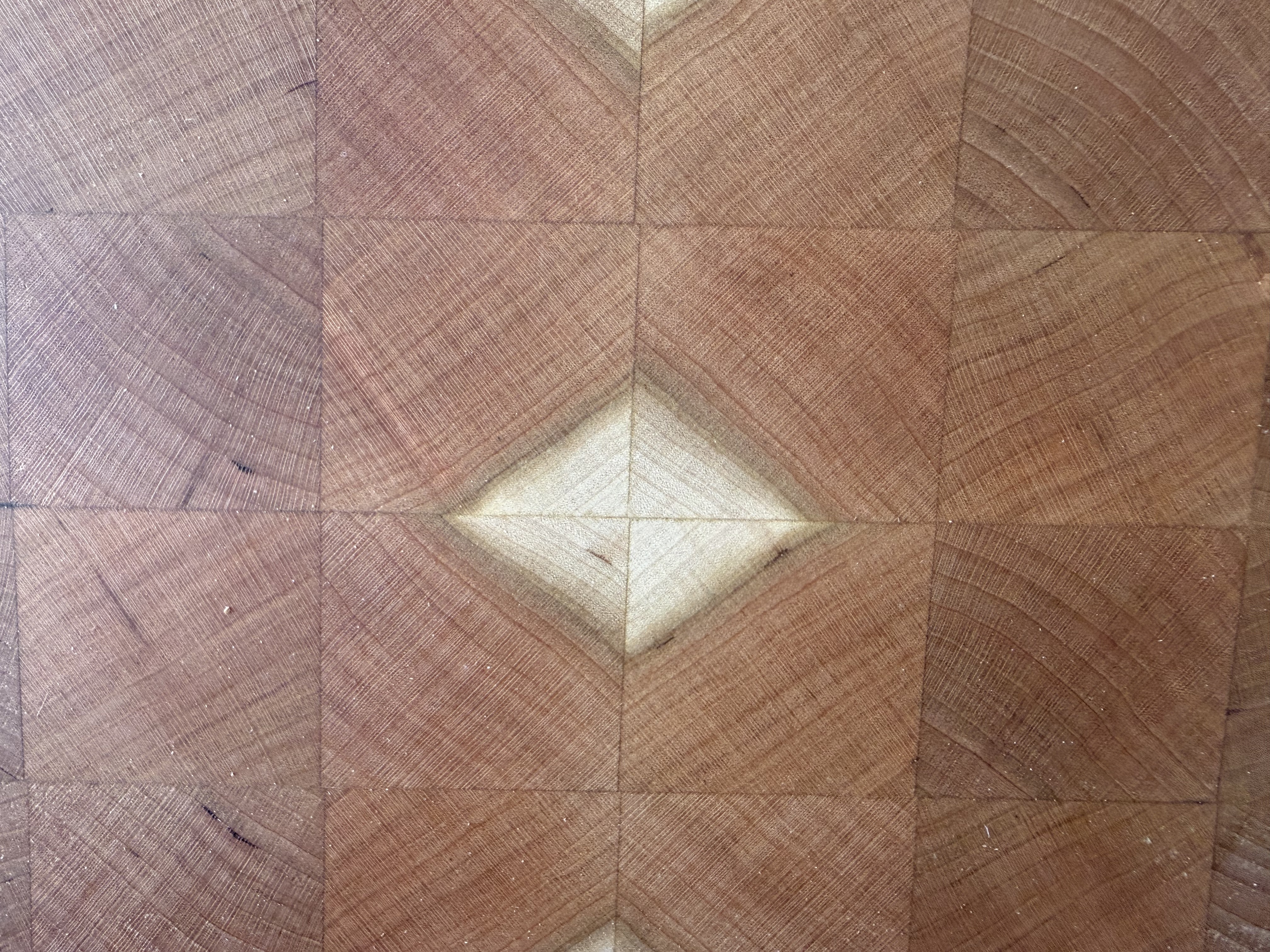 End-grain detail showing diamond pattern in cherry and maple